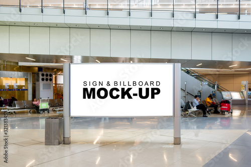 Mock up large blank advertising billboard at hall of airport