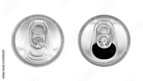 Drink in an iron jar. Open and closed banks. Top view. Close up. Isolated on a white background