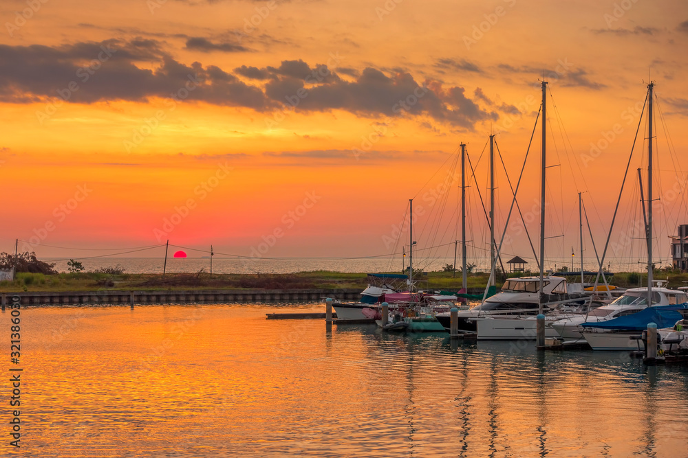 Boats and marina with beautiful sunset