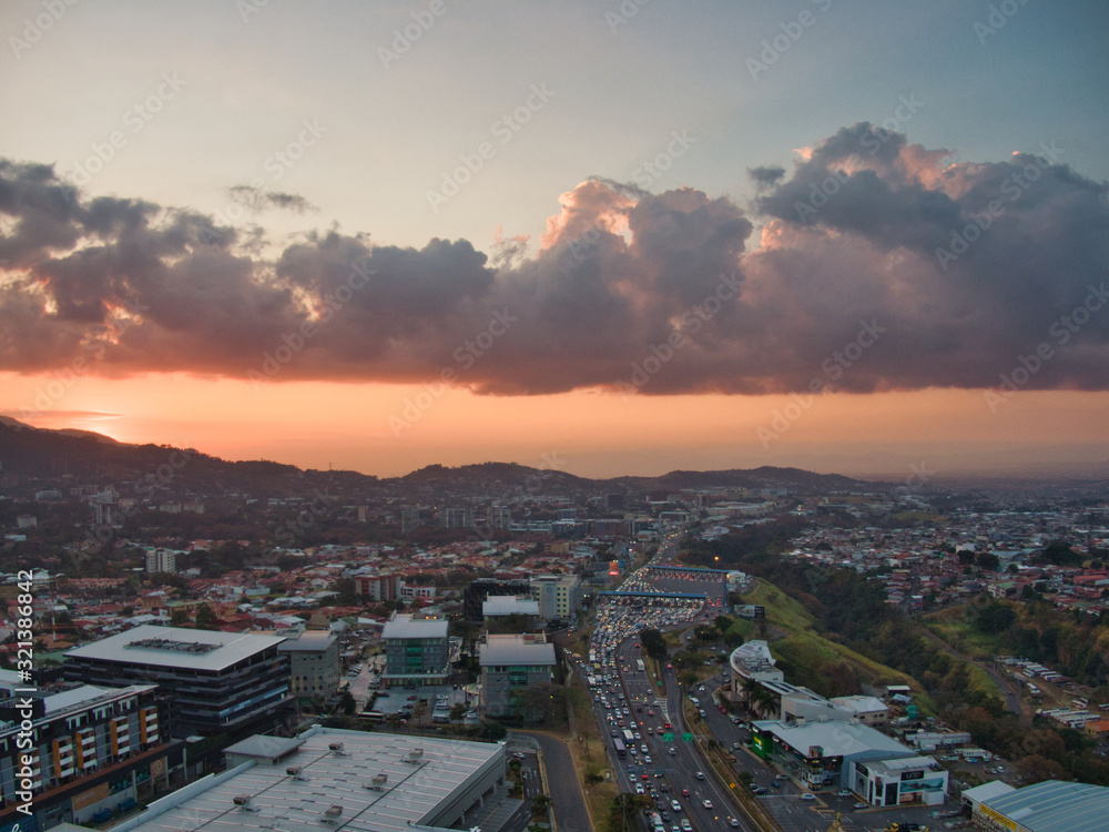 Fototapeta premium Sunset Aerial View of Escazu and Ruta 27 in Costa Rica
