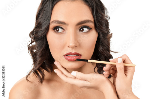 Makeup artist working with ...