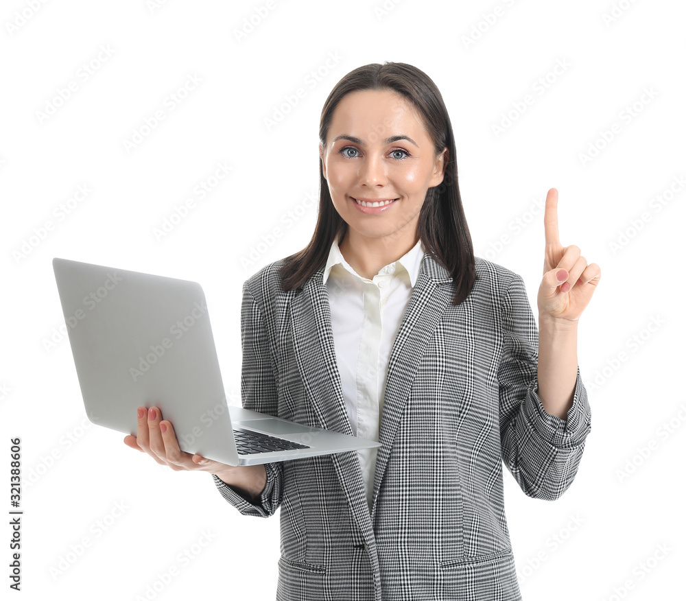 Young businesswoman with laptop and raised index finger on white background Young businesswoman with laptop and raised index finger on white background