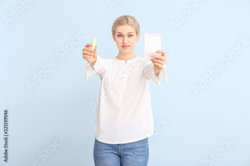 Young woman with menstrual ...