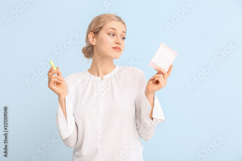 Young woman with menstrual ...