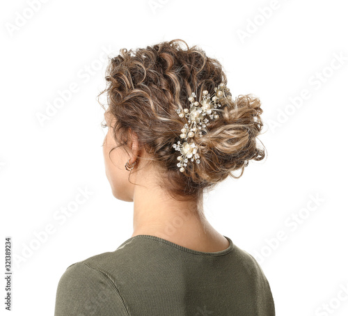 Young woman with beautiful hairdo on white background