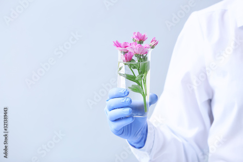 Scientist with flower sampl...