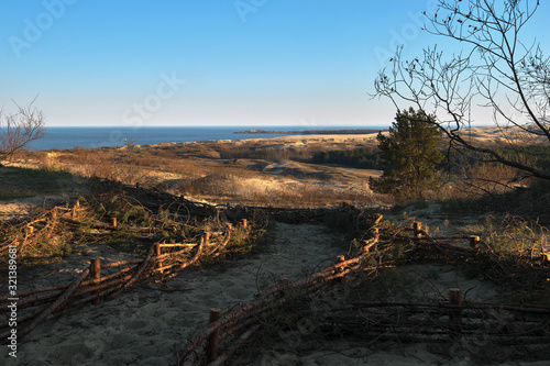 Sunset view of nordic dunes, early spring at Curonian spit, Nida, Klaipeda, Lithuania