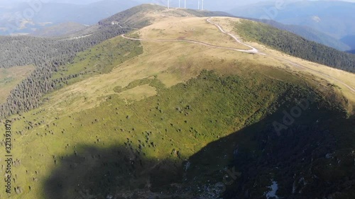 Drone Aerial of Varful Bihoru Romania Wind turbines Wind farm mountain peak green photo