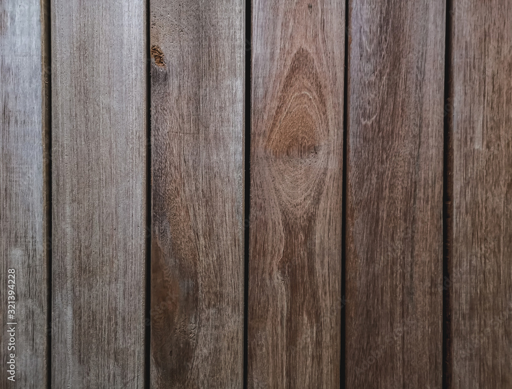 Brown annual ring and gnarl pattern on the old wood, material for decortion the wall Brown annual ring and gnarl pattern on the old wood, material for decortion the wall