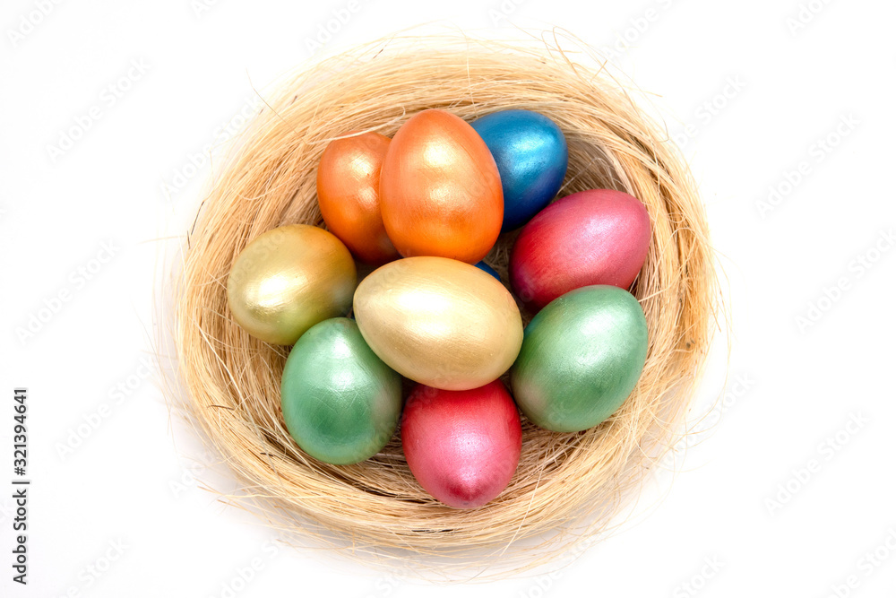 color easter eggs in basket isolated on white color easter eggs in basket isolated on white