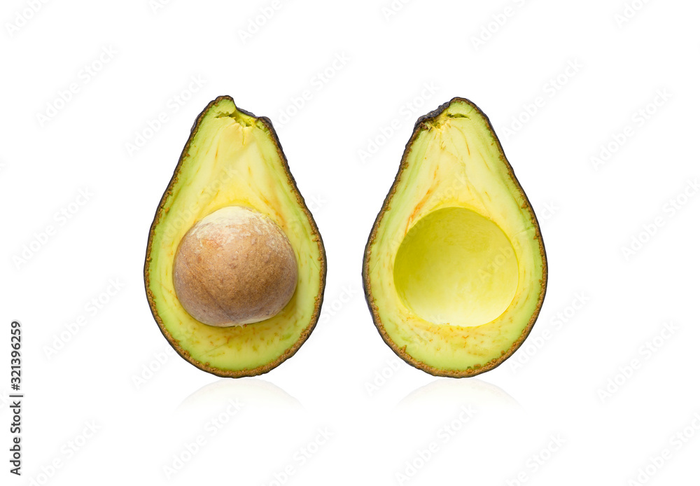A green avocado half fruit cutted diecut and isolated on white background with clipping path