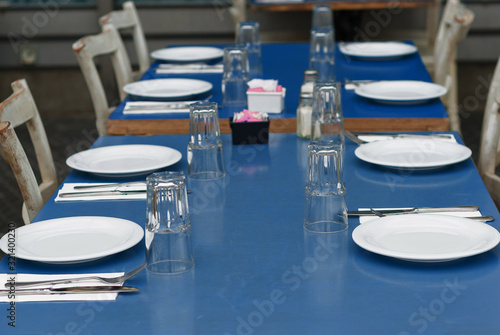 Trendy white and blue color 2020 outdoor table setting.