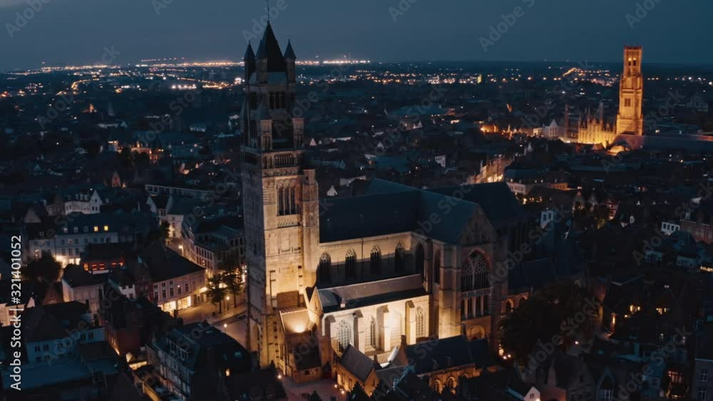 Belgium, Bruges: night drone view of St. Salvator's Cathedral and tower of Belfort Van Brugge Belgium, Bruges: night drone view of St. Salvator's Cathedral and tower of Belfort Van Brugge