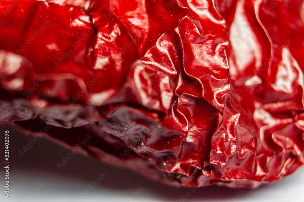 Red hot dried pepper close-up. Macro photo Red hot dried pepper close-up. Macro photo