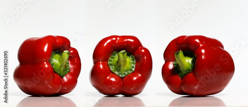 Set of fresh whole Red Bell Pepper isolated on white background.High resolution photo.