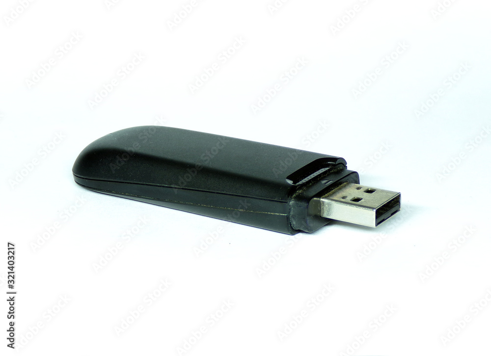 The USB flash drive is isolated on a white background. Electronic media in the form of a USB drive. The USB flash drive is isolated on a white background. Electronic media in the form of a USB drive.