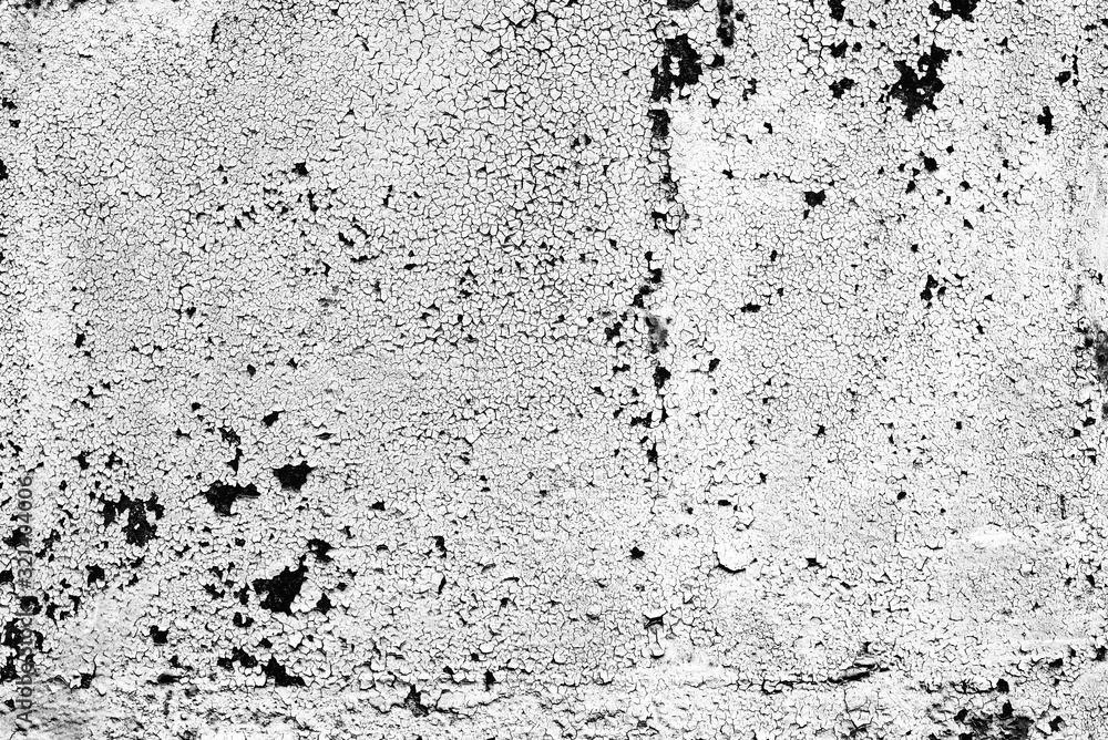 Fototapeta premium Texture of a metal wall with cracks and scratches which can be used as a background