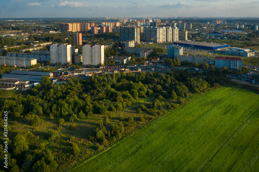 LOBNYA, MOSCOW REGION - AUGUST 31, 2019: Aerial view of the residential buildings of the city of Lobnya. Late bright summer evening