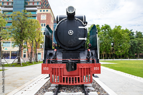 Steam engine locomotive train head, vintage old train at Siriraj Hospital Museum photo