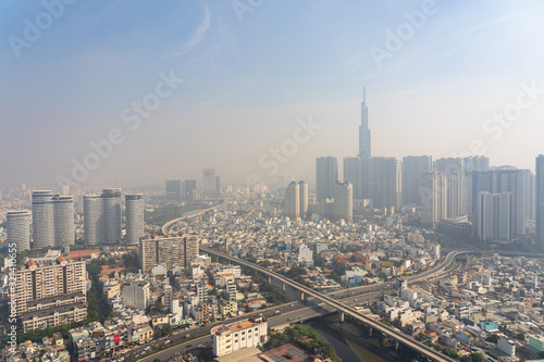 Industrial city background with sky hazed with smog 