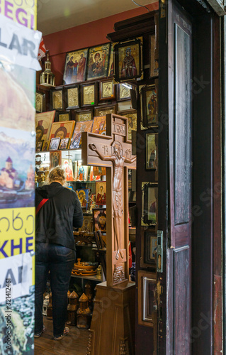 Religious items for sale in a small street shop on Kote Afkhazi St in the old part of the Tbilisi city in Georgia © svarshik
