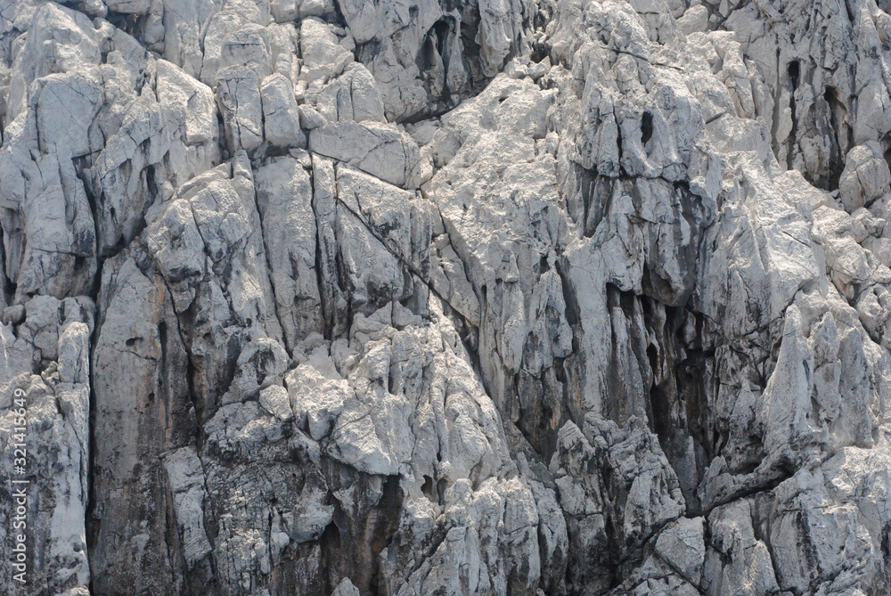 white stones and rock by the sea