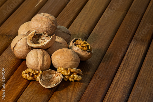 nut in a basket on wooden table
