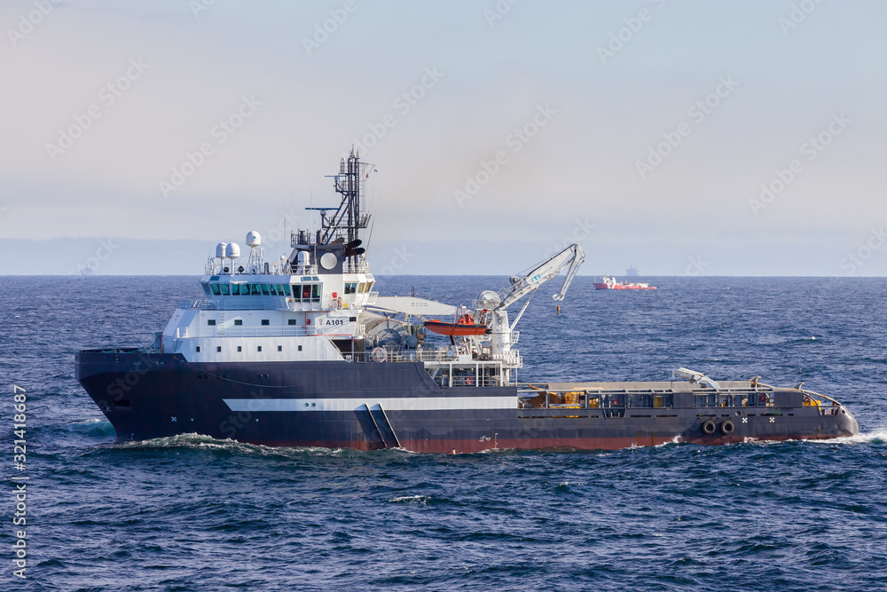NORTH SEA UK SECTOR - 2015 MAY 11. Norwegian anchor handler vessel  at work offshore