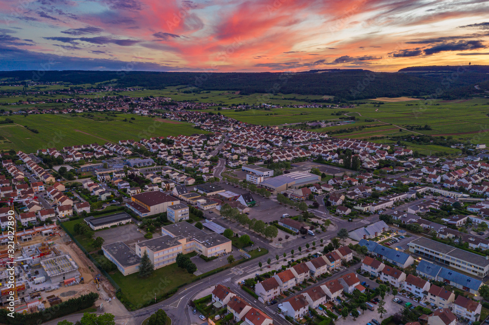 Fototapeta premium Beautiful townscape view of Dijon city at colorful sunset sky