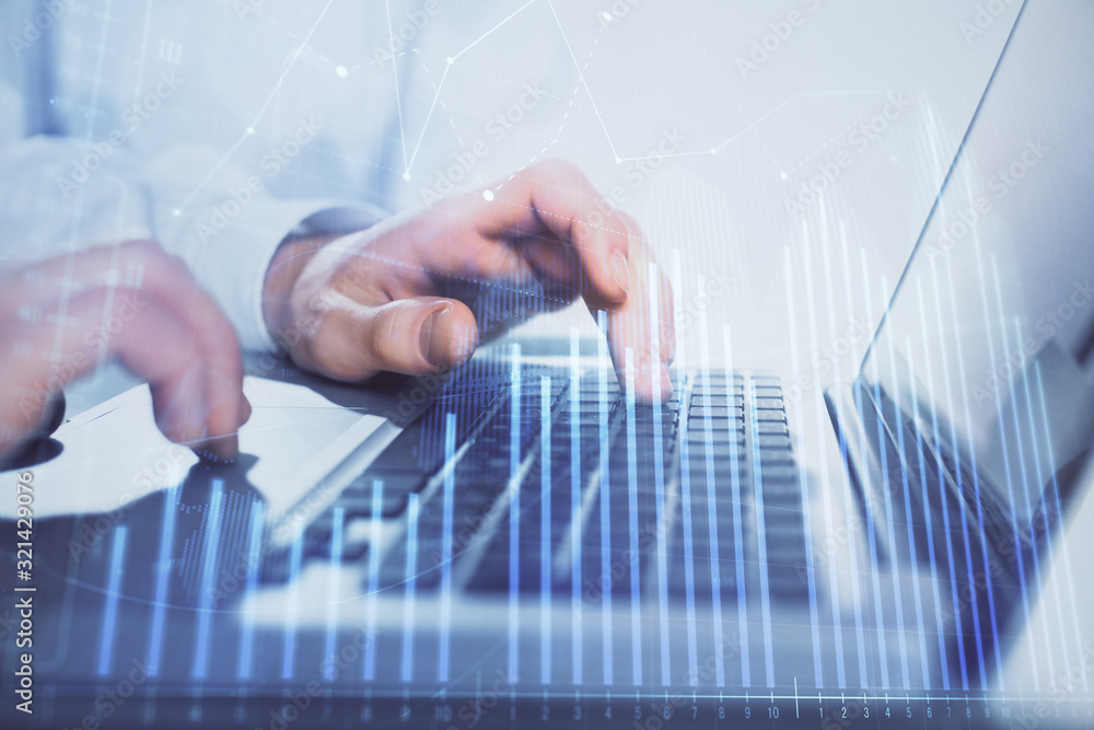 Double exposure of market chart with man working on computer on background. Concept of financial analysis. Double exposure of market chart with man working on computer on background. Concept of financial analysis.