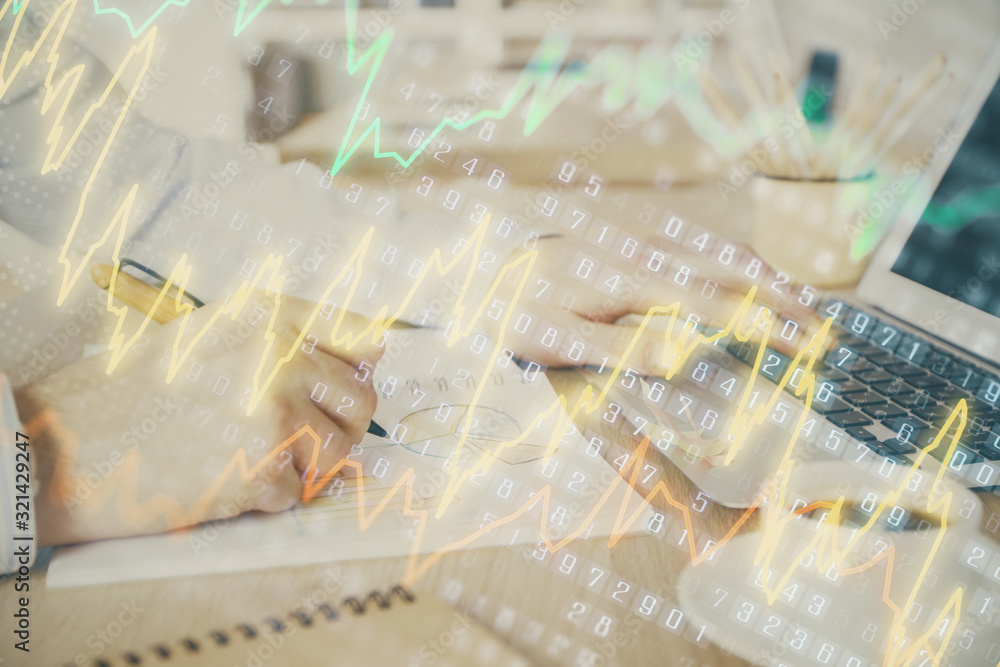 Multi exposure of stock market graph with man working on laptop on background. Concept of financial analysis. Multi exposure of stock market graph with man working on laptop on background. Concept of financial analysis.