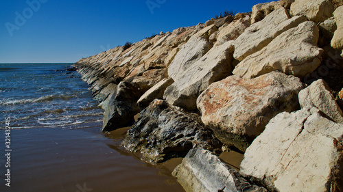 rock breakwater on the mediterranean coast © Vahit Telli