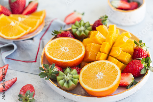 Horizontal shot of a bowl of fresh juicy fruit