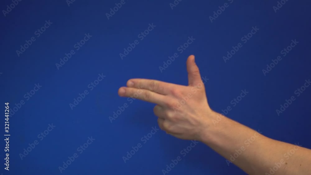 Hands show a shot from a gun, gesticulating Hands show a shot from a gun, gesticulating