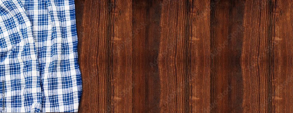 napkin tablecloth above wooden background