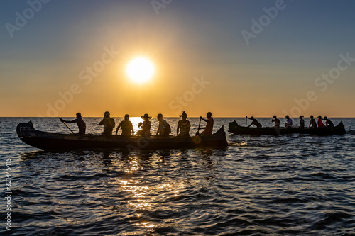 sunset on a boatrace in ifaty, madagascar photo