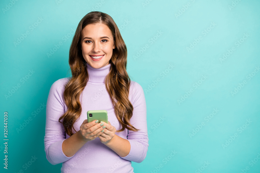 Photo of youngster lady hold telephone write creative popular blog post youth theme good mood wear purple jumper turtleneck isolated teal blue pastel color background Photo of youngster lady hold telephone write creative popular blog post youth theme good mood wear purple jumper turtleneck isolated teal blue pastel color background