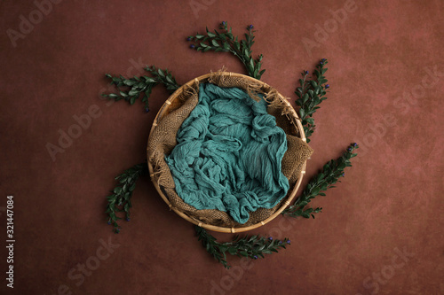 Newborn photography digital background prop. wicker basket on a painted canvas.