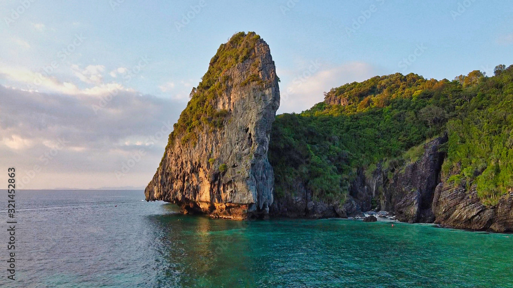 Phi Phi Don, Thailand. Aerial view of famous Nui Beach at sunset Phi Phi Don, Thailand. Aerial view of famous Nui Beach at sunset