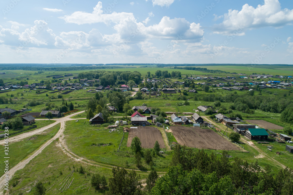 Obraz premium Kaygorodskoe village, Houses and gardens. Russia, Sverdlovsk region. Aerial, summer, sunny