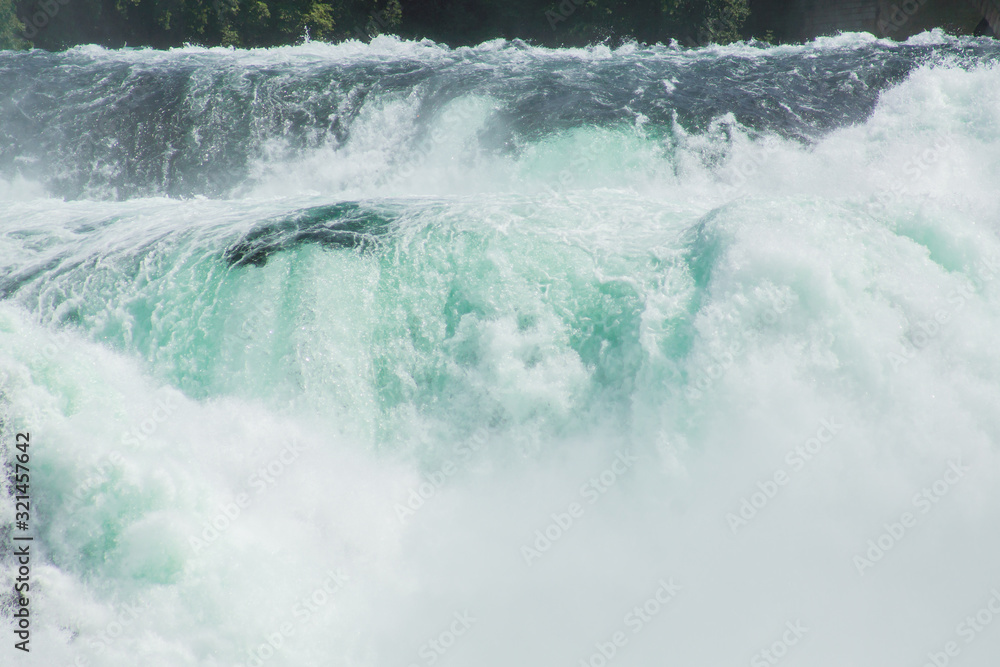 A front of roaring waters of the Rhine Falls.