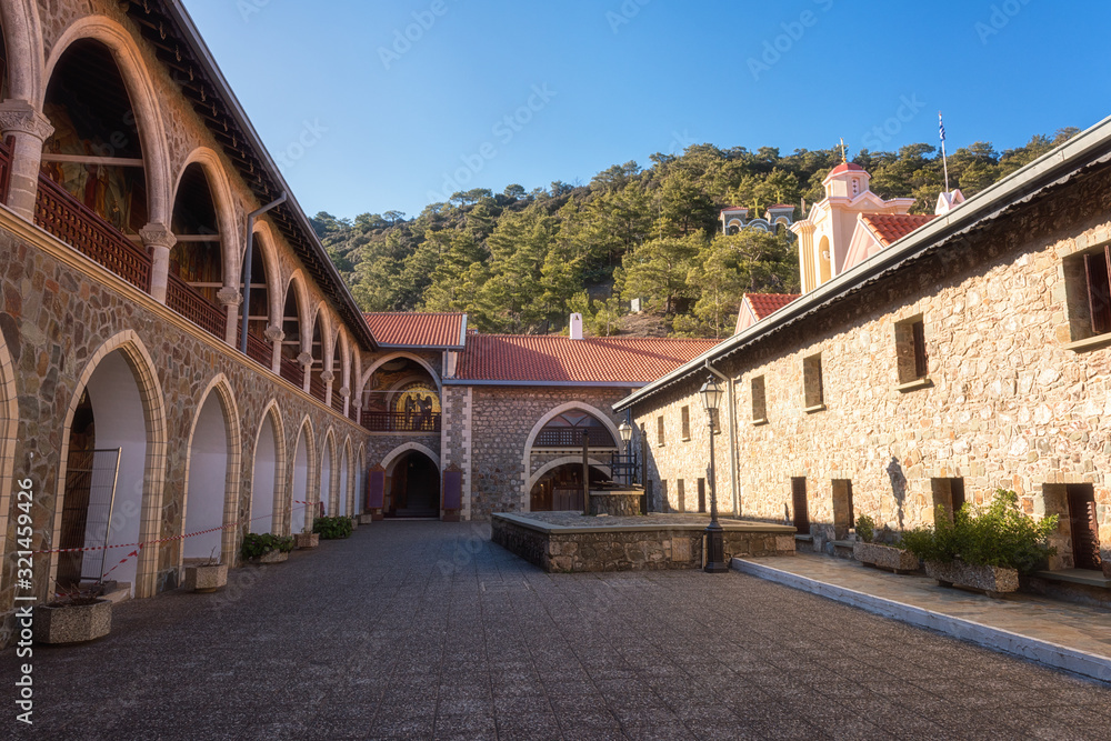 Courtyard of famous orthodox Kykkos monastery, Holy Monastery of the Virgin of Kykkos, Cyprus. Beautiful architectural landmark on a sunny day, religious and travel background