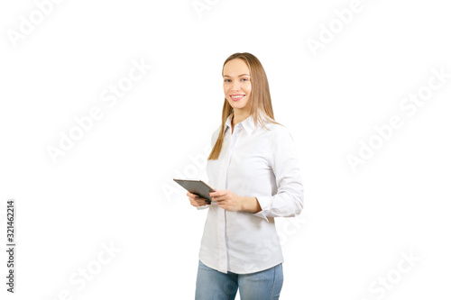 Smiling beautiful business woman with the tablet computer isolated on white.