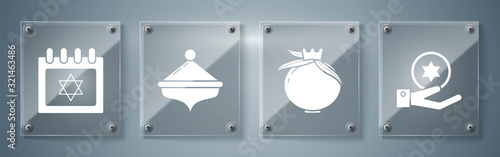 Set Jewish coin on hand, Pomegranate, Hanukkah dreidel and Jewish calendar with star of david. Square glass panels. Vector