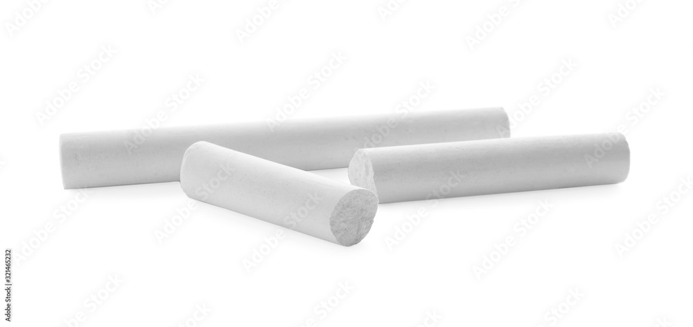 Small pieces of chalk on white background Small pieces of chalk on white background