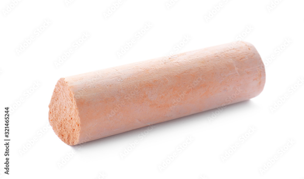 Small piece of orange chalk isolated on white Small piece of orange chalk isolated on white