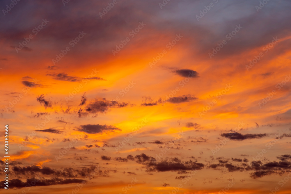 Evening cloudscape. Orange sky. Evening cloudscape. Orange sky.