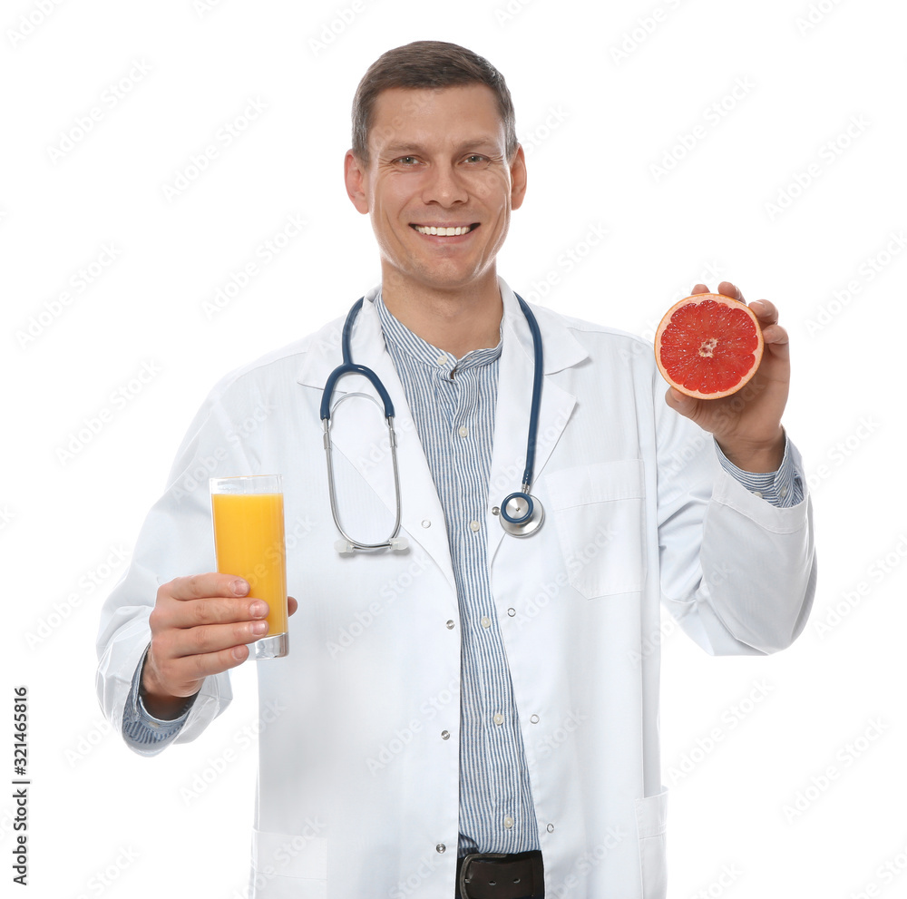Nutritionist with glass of juice and grapefruit on white background Nutritionist with glass of juice and grapefruit on white background