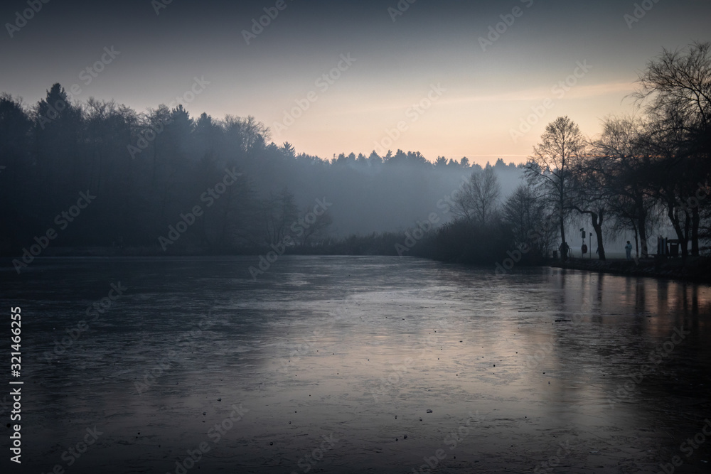 beautiful view on a frozen lake in winter season in beautiful sunset and mountains beautiful view on a frozen lake in winter season in beautiful sunset and mountains
