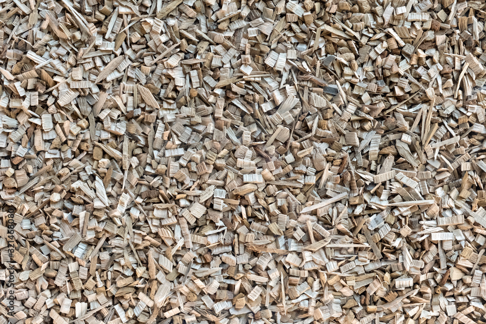 Wood chips, sawdust pile. Biofuel component. Biomass energy. Wood chips, sawdust pile. Biofuel component. Biomass energy.